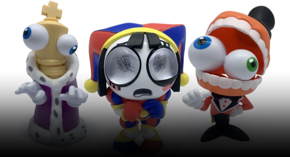 Vinyl figurines of Pomni, Kinger, and Caine made by Moose Toys